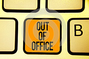 Text sign showing Out Of Office. Conceptual photo Outside the job Nobody in business Break Leisure Relax time Keyboard orange key