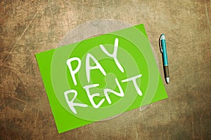 Text sign showing Pay Rent. Internet Concept To pay money in exchange for the use of someone else's property