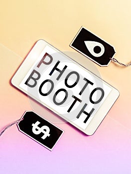 Text sign showing Photo Booth. Concept meaning form of photo sharing and publishing in the format of a blog