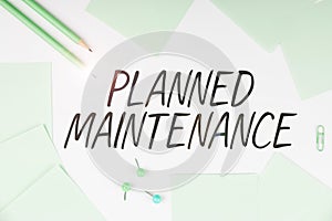 Text sign showing Planned Maintenance. Business approach Check ups to be done Scheduled on a Regular Basis photo