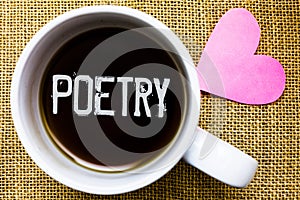 Text sign showing Poetry. Conceptual photo Literary work Expression of feelings ideas with rhythm Poems writing Tea time coffee cu