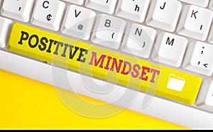 Text sign showing Positive Mindset. Conceptual photo mental attitude in wich you expect favorable results White pc keyboard with