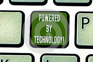 Text sign showing Powered By Technology. Conceptual photo Breakthrough led to the broad commercialization Keyboard key