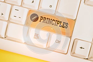 Text sign showing Principles. Conceptual photo fundamental truth that serves as the base for a system of belief White pc