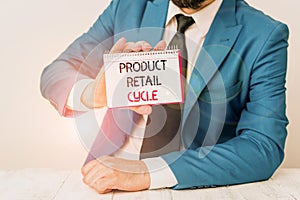 Text sign showing Product Retail Cycle. Conceptual photo as brand progresses through sequence of stages Man holds empty