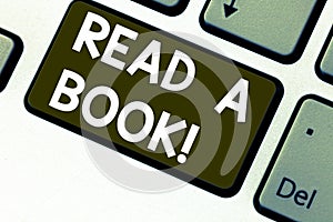 Text sign showing Read A Book. Conceptual photo Enjoy literature traditional activity learn new things Keyboard key Intention to