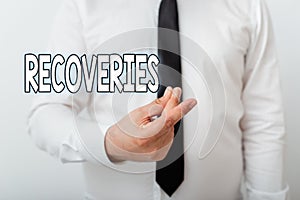 Text sign showing Recoveries. Conceptual photo process of regaining possession or control of something lost Model with