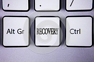 Text sign showing Recovery. Conceptual photo Return to normal state of health Regain possession or control written on White Keyboa