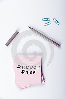 Text sign showing Reduce Risk. Word for lessen the potential damage that could be caused by a hazard