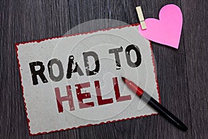 Text sign showing Road To Hell. Conceptual photo Extremely dangerous passageway Dark Risky Unsafe travel White page red borders ma