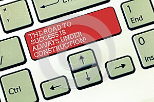 Text sign showing The Road To Success Is Always Under Construction. Conceptual photo In continuous improvement Keyboard
