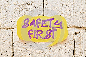 Text sign showing Safety First. Conceptual photo Avoid any unnecessary risk Live Safely Be Careful Pay attention