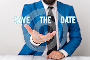 Text sign showing Save The Date question. Conceptual photo asking someone to remember specific day or time Man holds