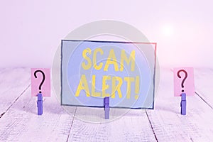 Text sign showing Scam Alert. Conceptual photo fraudulently obtain money from victim by persuading him Scribbled and crumbling