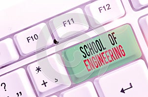 Text sign showing School Of Engineering. Conceptual photo college to study mechanical communication subjects White pc