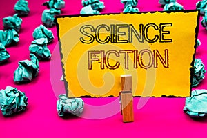 Text sign showing Science Fiction. Conceptual photo Fantasy Entertainment Genre Futuristic Fantastic Adventures Clothespin hold ho