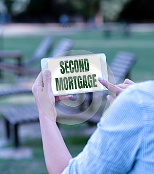 Text sign showing Second Mortgage. Conceptual photo lien on property which is subordinate to more senior one Voice And