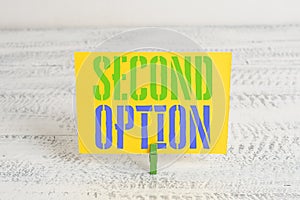 Text sign showing Second Option. Conceptual photo Next Fiddle Not a priority Next Alternative Opportunity Green clothespin white