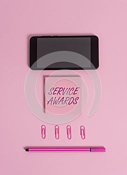 Text sign showing Service Awards. Conceptual photo Recognizing an employee for his or her longevity or tenure Colored