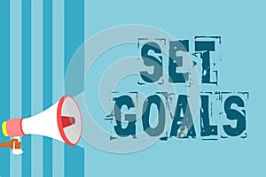 Text sign showing Set Goals. Conceptual photo Defining or achieving something in the future based on plan Megaphone loudspeaker bl