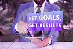 Text sign showing Set Goals, Get Results. Conceptual photo Establish objectives work for accomplish them Businessman
