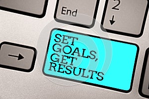 Text sign showing Set Goals, Get Results. Conceptual photo Establish objectives work for accomplish them Silver grey computer keyb