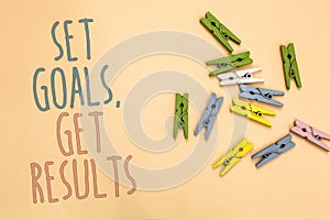 Text sign showing Set Goals, Get Results. Conceptual photo Establish objectives work for accomplish them Yellow base with painted