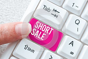 Text sign showing Short Sale. Business overview Home that is offered at a price that is less than the amount owed Typing