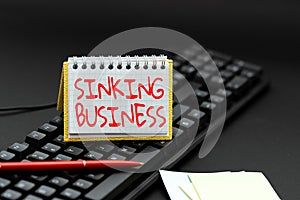Text sign showing Sinking Business. Conceptual photo the company or other organization that is failing Copying Old Ideas