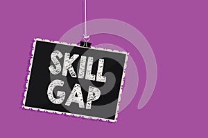 Text sign showing Skill Gap. Conceptual photo Refering to a person's weakness or limitation of knowlege Hanging blackboard messag