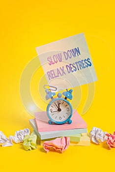 Text sign showing Slow Down Relax Destress. Conceptual photo calming bring happiness and put you in good mood Alarm