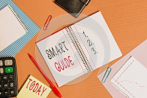 Text sign showing Smart Guide. Conceptual photo used to guide the development of measurable goals to attain Striped