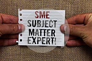 Text sign showing Sme Subject Matter Expert. Conceptual photo Authority in a particular area or topic Domain Man holding