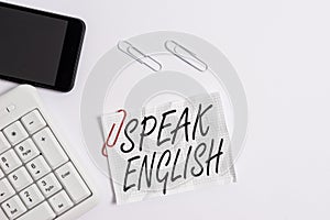 Text sign showing Speak English. Conceptual photo Study another Foreign Language Online Verbal Courses White pc keyboard