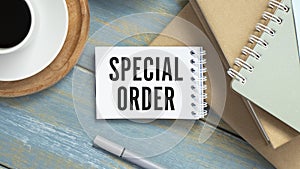 sign showing Special Order. A special item requested by the military headquarters for a daily note. White a blank sheet for photo