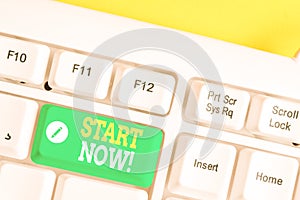 Text sign showing Start Now. Conceptual photo do not hesitate get working or doing stuff right away White pc keyboard