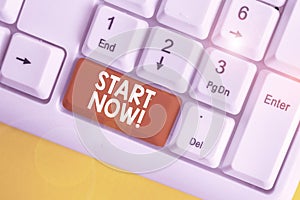 Text sign showing Start Now. Conceptual photo do not hesitate get working or doing stuff right away White pc keyboard with empty