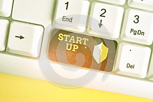 Text sign showing Start Up Technology. Conceptual photo Young Technical Company initially Funded or Financed White pc photo