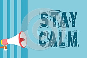 Text sign showing Stay Calm. Conceptual photo Maintain in a state of motion smoothly even under pressure Megaphone loudspeaker blu