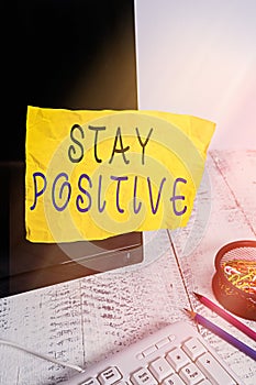 Text sign showing Stay Positive. Conceptual photo Engage in Uplifting Thoughts Be Optimistic and Real Note paper taped to black