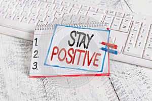 Text sign showing Stay Positive. Conceptual photo Engage in Uplifting Thoughts Be Optimistic and Real notebook paper reminder