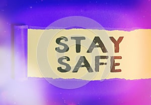 Text sign showing Stay Safe. Conceptual photo secure from threat of danger, harm or place to keep articles Rolled ripped