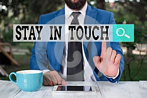 Text sign showing Stay In Touch. Conceptual photo Keep Connected thru Phone Letters Visit Email Social Media Businessman