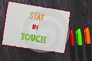 Text sign showing Stay In Touch. Conceptual photo Keep Connected thru Phone Letters Visit Email Social Media White paper red borde