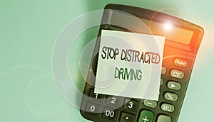 Text sign showing Stop Distracted Driving. Conceptual photo asking to be careful behind wheel drive slowly Portable