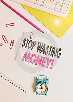 Text sign showing Stop Wasting Money. Conceptual photo advicing demonstrating to start saving and use it wisely Flat lay