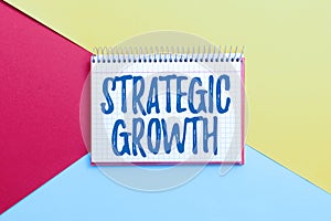 Text sign showing Strategic Growth. Conceptual photo create plan or schedule to increase stocks or improvement Colorful