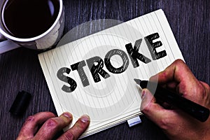 Text sign showing Stroke. Conceptual photo Patients losing consciousness due to poor blood flow medical Black coffee white cup pap