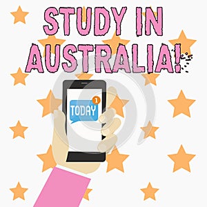 Text sign showing Study In Australia. Conceptual photo going into foreign country order complete your studies Human Hand