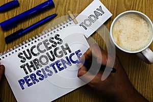 Text sign showing Success Through Persistence. Conceptual photo never give up in order to reach achieve dreams Man holding marker